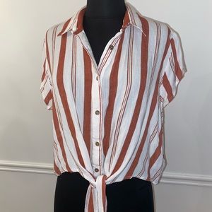 White and copper striped blouse.